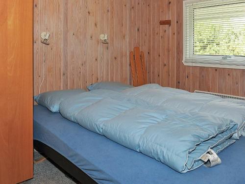 Säng eller sängar i ett rum på Holiday home Nørre Nebel XXI
