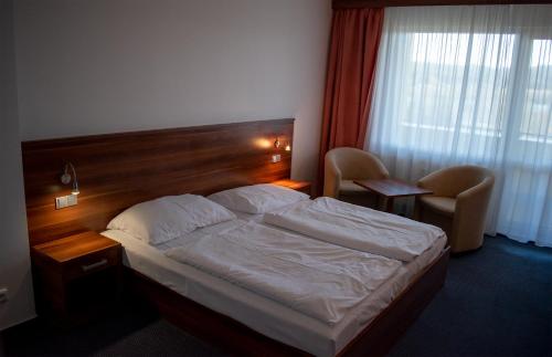 Postel nebo postele na pokoji v ubytování Lipno Wellness - Frymburk C 401