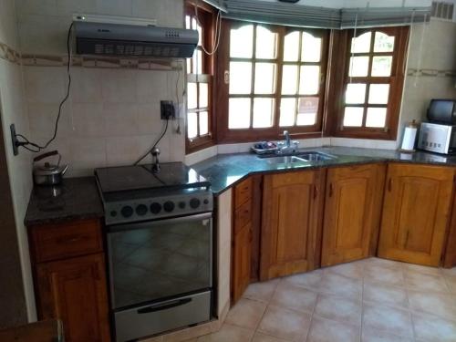 Kuchyň nebo kuchyňský kout v ubytování Complejo Norte