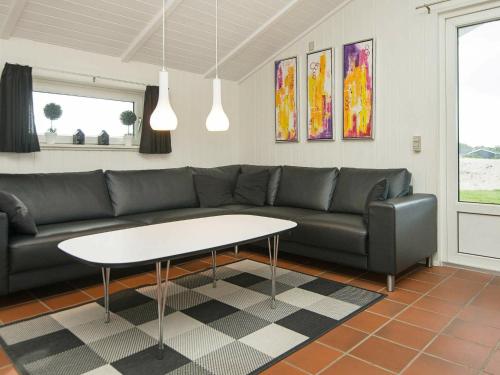 A seating area at Inviting Holiday Home in Vejers Strand with Sauna
