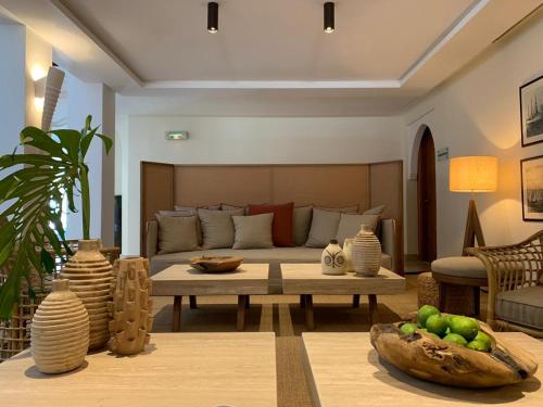 a living room with a couch and a table at Marina Smir Hotel & Spa in M'diq