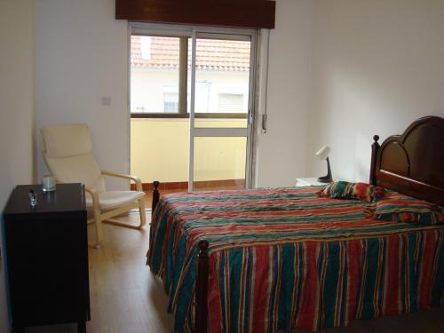 Postel nebo postele na pokoji v ubytování 2Bed 15km Lisbon - Wifi, Ac, Parking