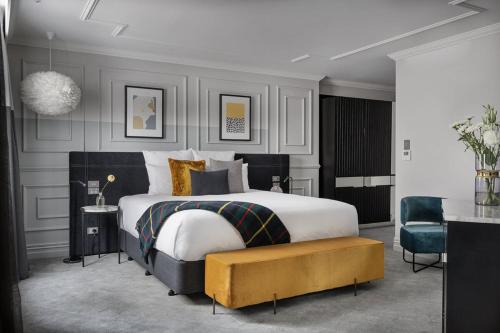 מיטה או מיטות בחדר ב-Fable Dunedin