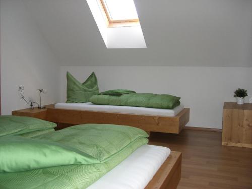Postel nebo postele na pokoji v ubytování Brandstättergut