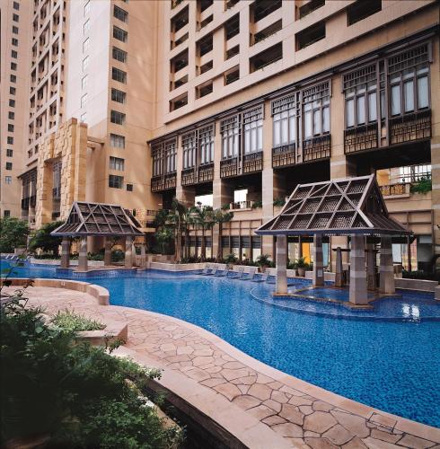 Bazén v ubytování Rambler Oasis Hotel nebo v jeho okolí
