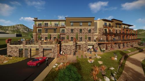 a rendering of a building with a red car parked in front at Holiday Inn Express Durango Downtown- Animas River in Durango