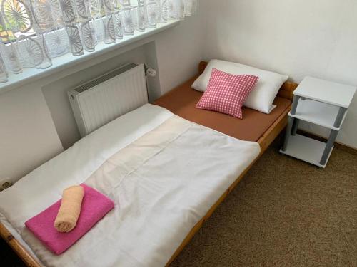Postel nebo postele na pokoji v ubytování Ferienhaus Anna