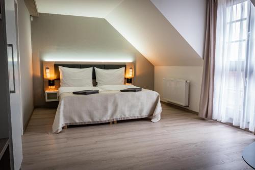 Posteľ alebo postele v izbe v ubytovaní Apartmány Zámek - Vimperk