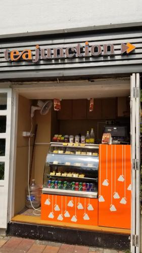 a store front of a bakery with a sign on it at The Samilton in Kolkata