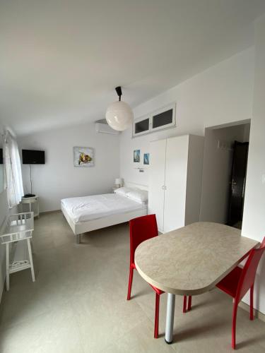 Postel nebo postele na pokoji v ubytování Apartmani Marko