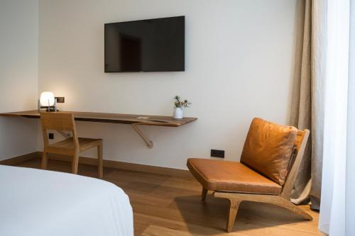 TV a/nebo společenská místnost v ubytování Hotel Arbaso