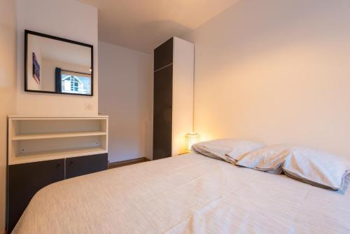 Katil atau katil-katil dalam bilik di Appartement Terrasse - Télécabine 2min - Thermes 4min - Tout équipé