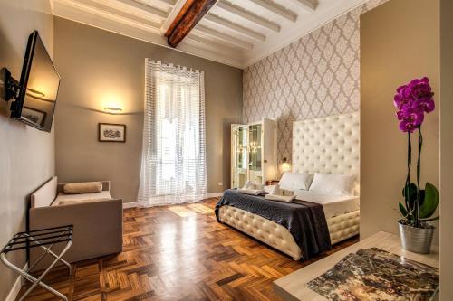 Posteľ alebo postele v izbe v ubytovaní Elysium Suites collection