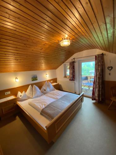 Postel nebo postele na pokoji v ubytování Haus Sonnegg