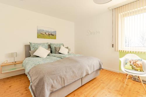 Postel nebo postele na pokoji v ubytování Mittagsblick