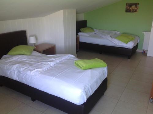 Katil atau katil-katil dalam bilik di Holiday Home Koolhof