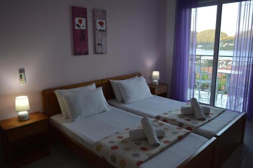 Ένα ή περισσότερα κρεβάτια σε δωμάτιο στο Rania Studios