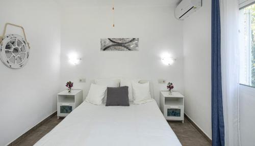 Ένα ή περισσότερα κρεβάτια σε δωμάτιο στο Casa Enriqueta