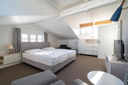 Postel nebo postele na pokoji v ubytování Haus Heidelberg