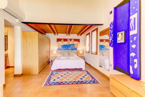 Postel nebo postele na pokoji v ubytování Villa Camp Gran by Sealand Villas