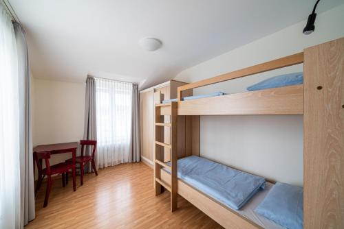 Ένα ή περισσότερα κρεβάτια σε δωμάτιο στο Haus Sonnenschein Göhren