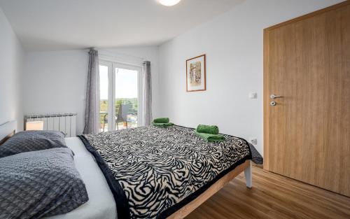 Cama o camas de una habitación en Apartments Nelle