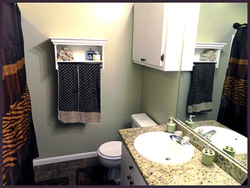 a bathroom with a sink and a toilet at Mango Marco in Marco Island