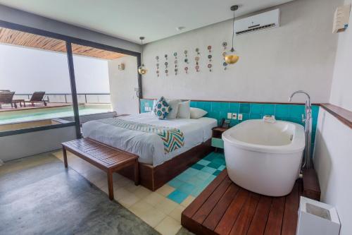 Cama o camas de una habitación en O' Tulum Boutique Hotel - Adults Only