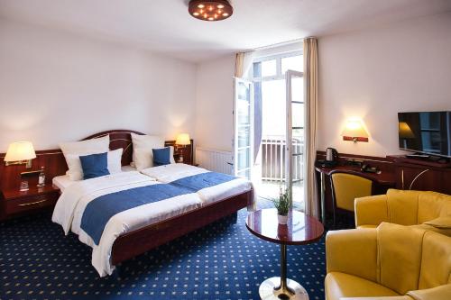 Hotel Meeresruh Garni tesisinde bir odada yatak veya yataklar