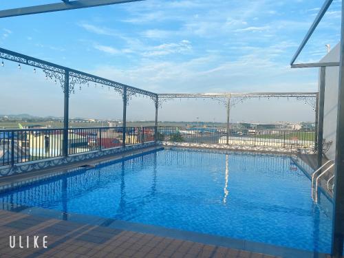 a large swimming pool on top of a building at Paragon House and Residence in Hanoi