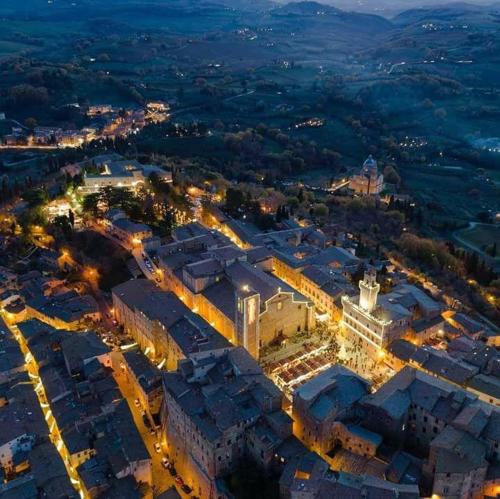 an overhead view of a city at night at Appartamento Panoramico in Montepulciano