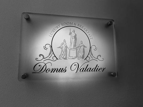 a sign that reads domus valilliler on a wall at Domus Valadier B&B Guesthouse in Fiumicino