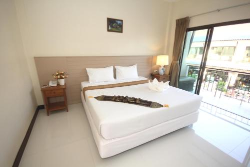 A bed or beds in a room at Phangan Island View - SHA Extra Plus