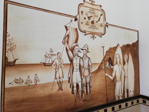 a mural on the wall of a room at Sun Akademie in Las Palmas de Gran Canaria