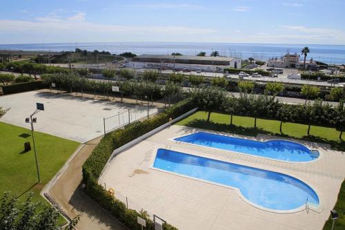 AT039 Comunidad con 2 piscinas, a 5 min a pie de la playa