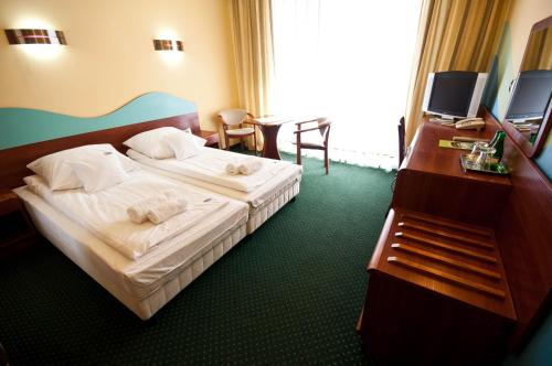 Un ou plusieurs lits dans un hébergement de l'établissement Hotel Arka Spa