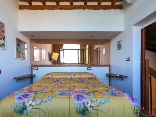 Uma cama ou camas num quarto em Soggiorno Rubino