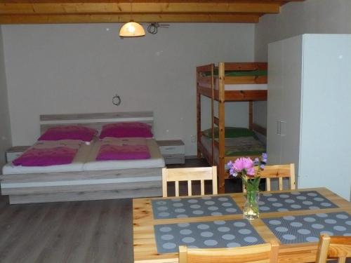 Postel nebo postele na pokoji v ubytování Apartmány Viktorín