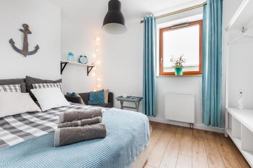 Posteľ alebo postele v izbe v ubytovaní GoodHome - Sea Towers Apartment