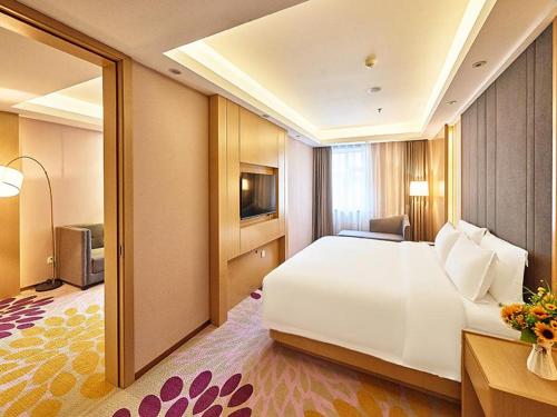 Giường trong phòng chung tại Lavande Hotel Changchun Peoples Square