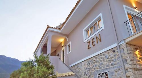 a house with a number on the side of it at ZEN Minimal Luxury Housing Tyros in Tiros