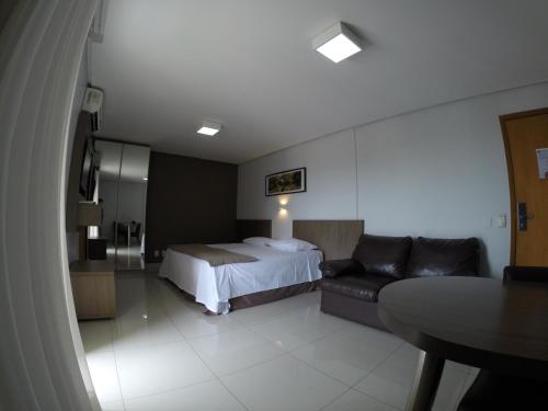 Tempat tidur dalam kamar di Flat Apart Hotel Crystal Place