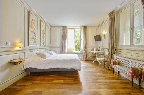 מיטה או מיטות בחדר ב-Hotel Villa Catarie