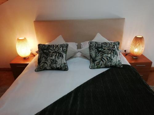 Ένα ή περισσότερα κρεβάτια σε δωμάτιο στο HOUSE 4U - Cozy Apartment with Mezzanine