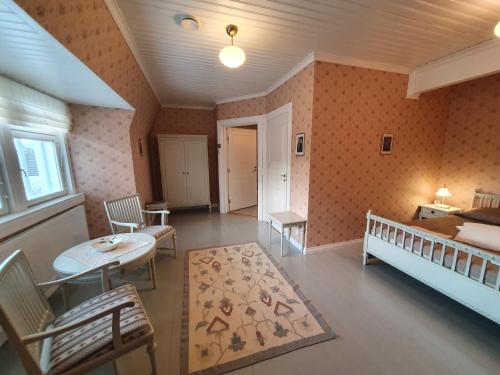 Ένα ή περισσότερα κρεβάτια σε δωμάτιο στο B&B Lomamokkila