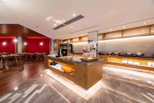 Un restaurant sau alt loc unde se poate mânca la Xence hotel near Xiamen Airport & SM Mall