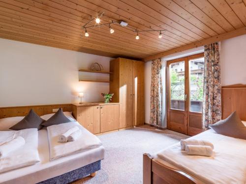Posteľ alebo postele v izbe v ubytovaní Ferienhaus Gänseblümchen