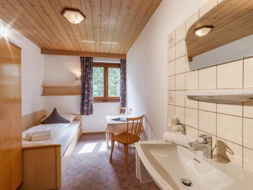 Posteľ alebo postele v izbe v ubytovaní Ferienhaus Gänseblümchen