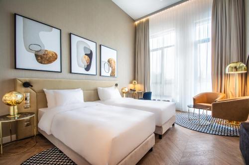 Postel nebo postele na pokoji v ubytování Radisson Blu Hotel Sopot