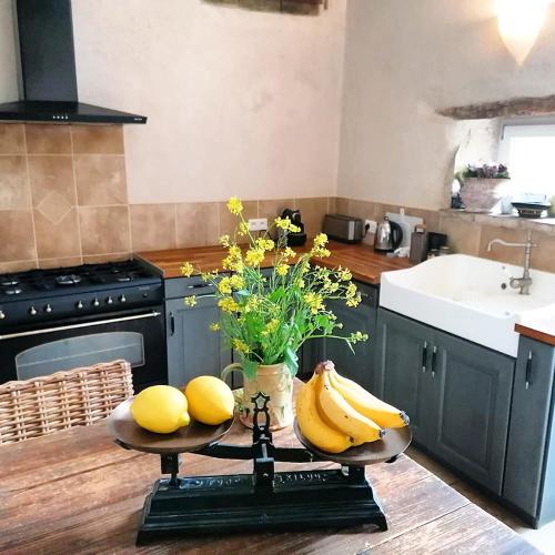 Dapur atau dapur kecil di Gîte La Maison De Lucien